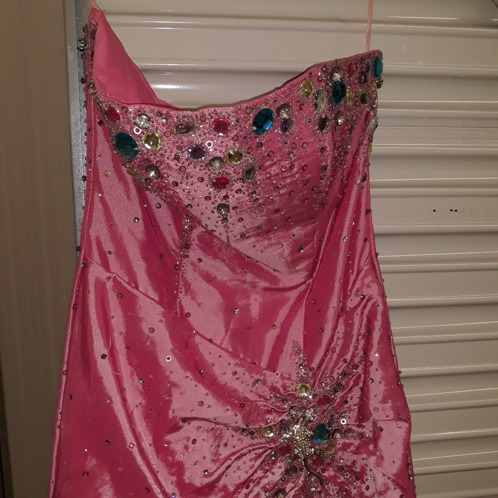 Pink Evening Gown, 100% Polyester with a colored broach with sequins, size 4